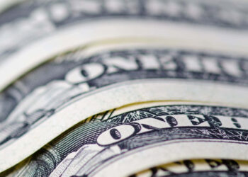 Dollar Sinks as Gold Soars in Tumultuous First Half