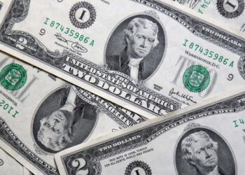 Dollar Heads for First Monthly Gain of 2025