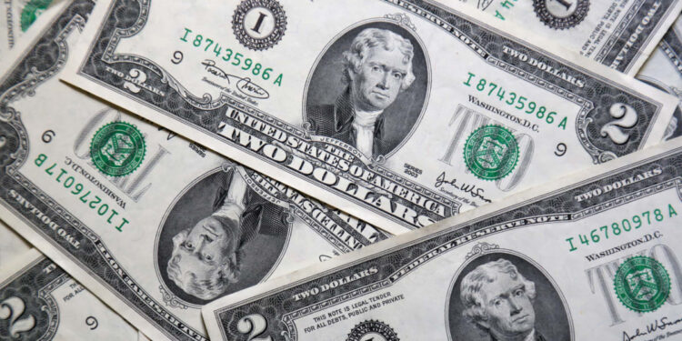 Dollar Heads for First Monthly Gain of 2025